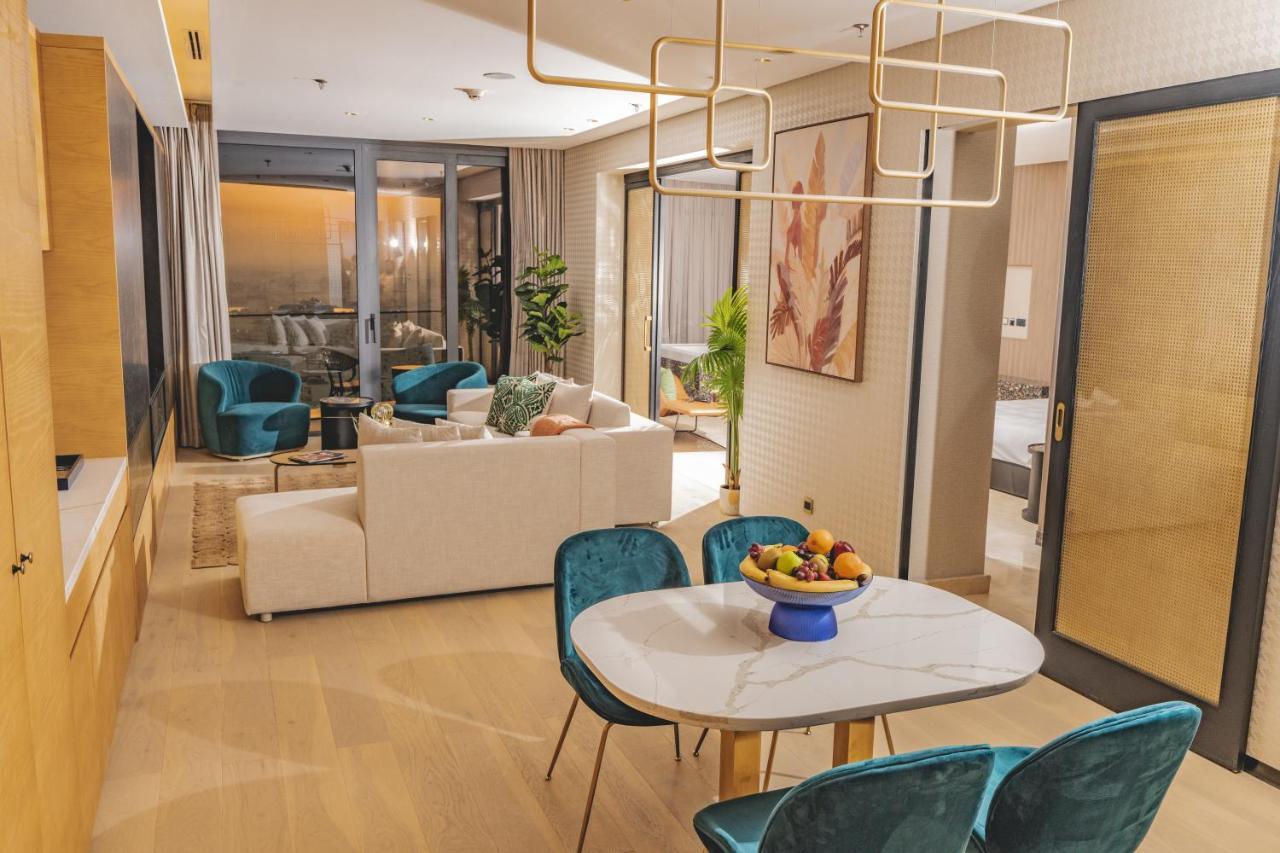 The House Hotel Al Khiran Bagian luar foto