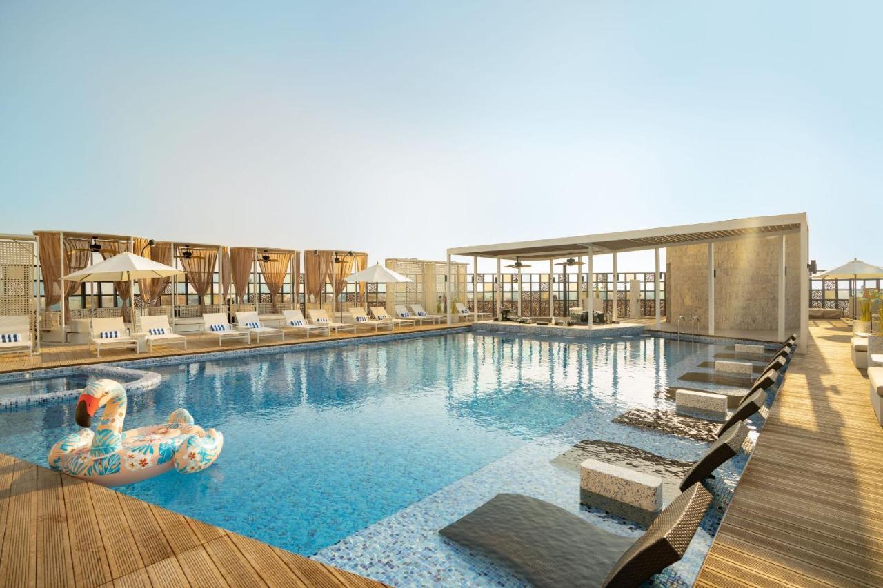 The House Hotel Al Khiran Bagian luar foto