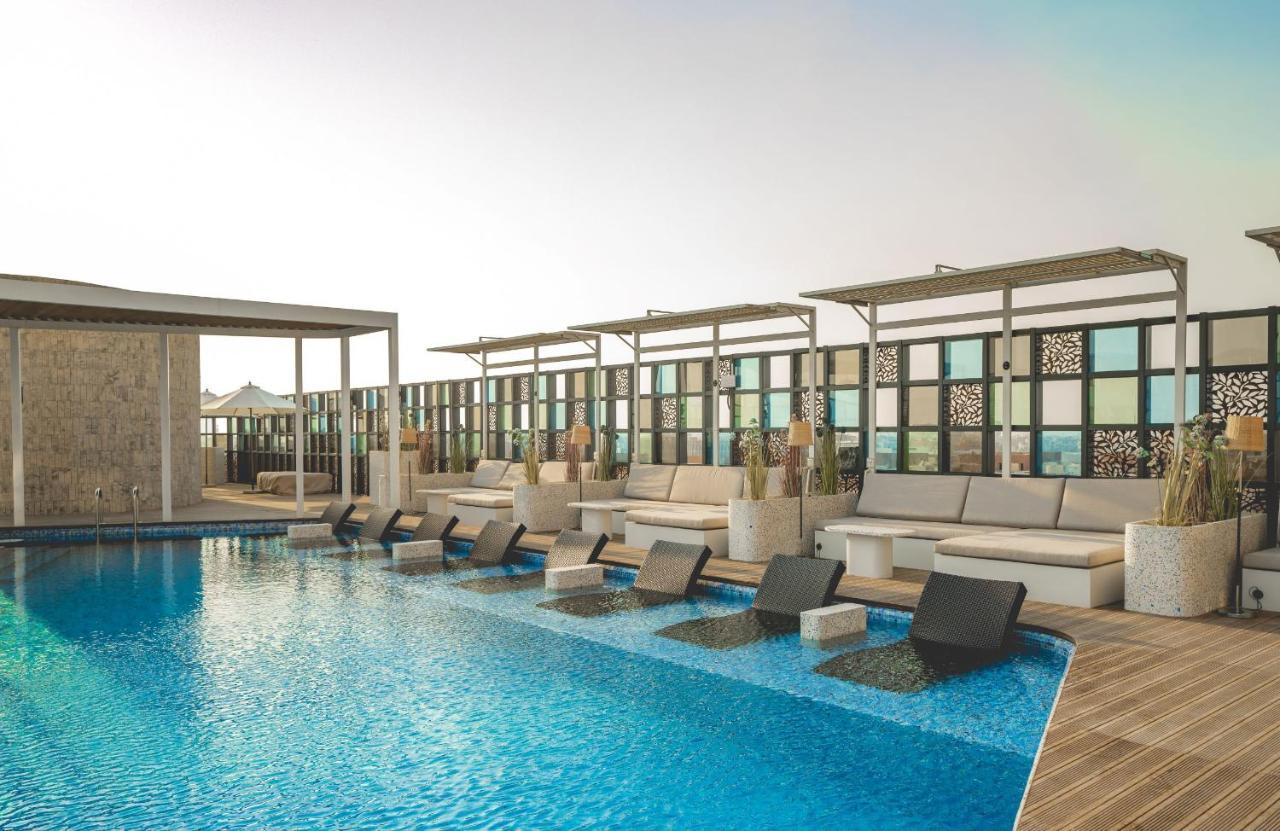 The House Hotel Al Khiran Bagian luar foto