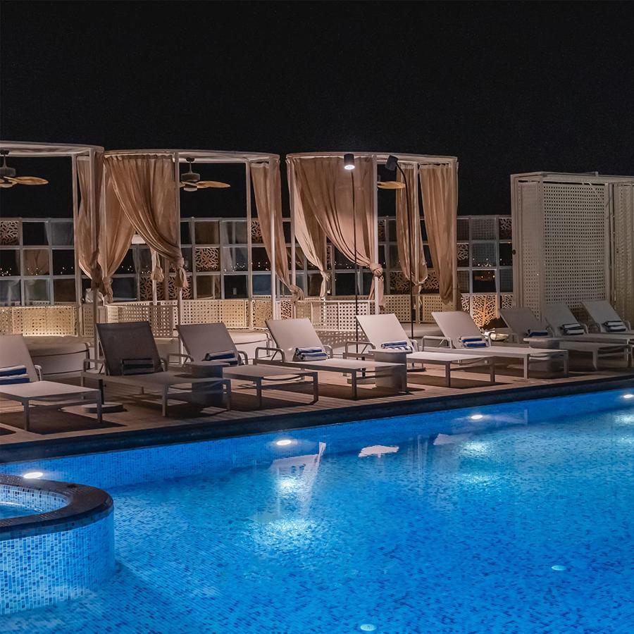 The House Hotel Al Khiran Bagian luar foto