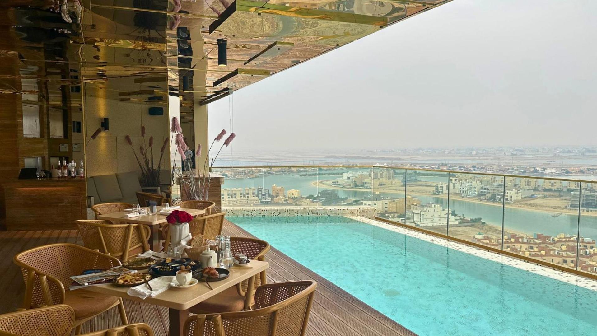 The House Hotel Al Khiran Bagian luar foto